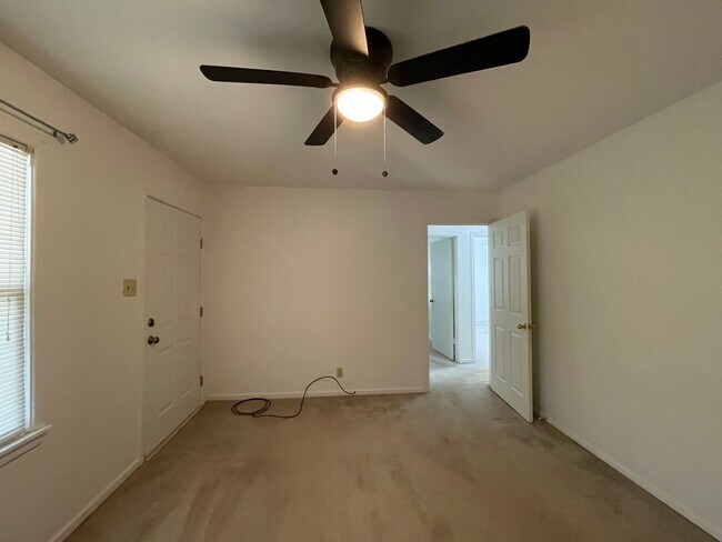 Building Photo - Your New Snyder Sanctuary: Modern Updates, Massive Storage & a Cozy Porch