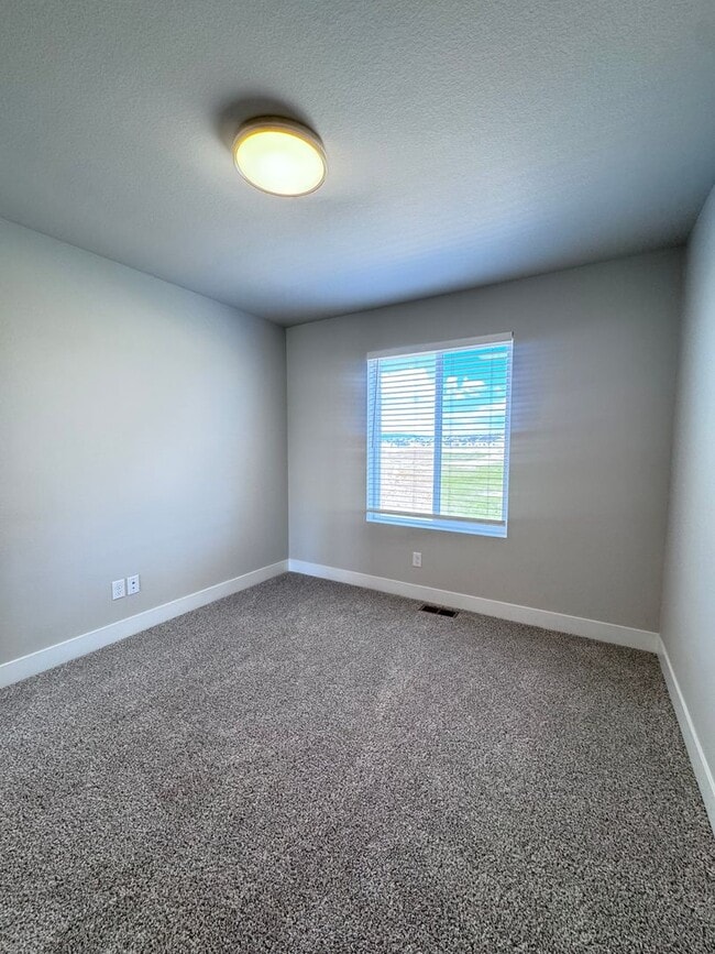 Building Photo - Sage Meadows II Townhomes — Lakeside Living Meets Modern Comfort!