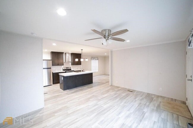 Building Photo - Spacious 4-Bedroom Home with Lawn Maintena...