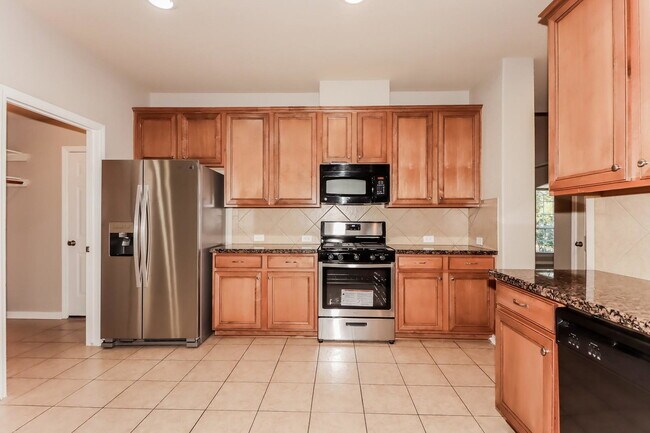 Building Photo - Enchanted Rock Lane, Missouri City, TX 77459 - 4 BR 2 BA single-family home