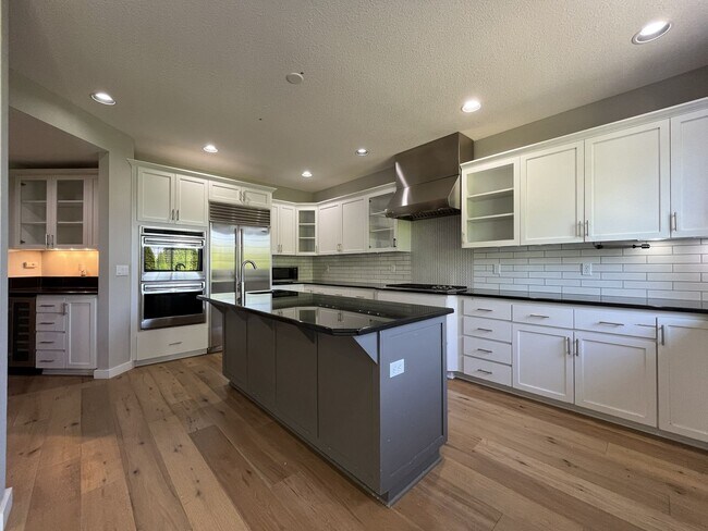 Building Photo - Beautifully Updated 3-Bedroom Bethany Home with Chef's Kitchen, Huge Bonus Room and Private Backyard