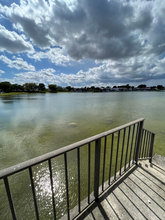 Staircase leading to lake (right side) - 1424 SW 131st Place Cir E