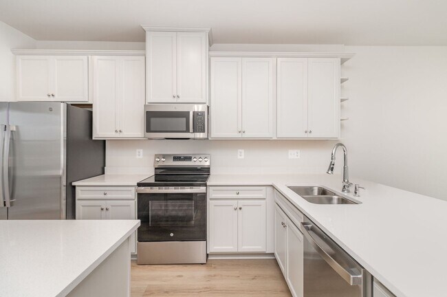 Building Photo - New Construction 3 Bedroom Townhome in Fre...