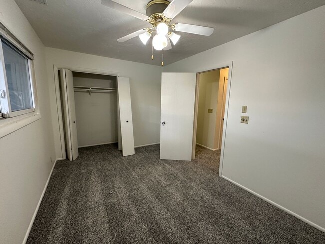 Building Photo - Spacious, three level, 4 Bed 2.5 bath Townhome in Ammon right behind the Walmart on Hitt.