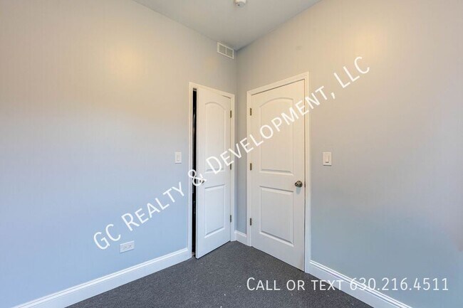 Building Photo - 6433 S Vernon Ave