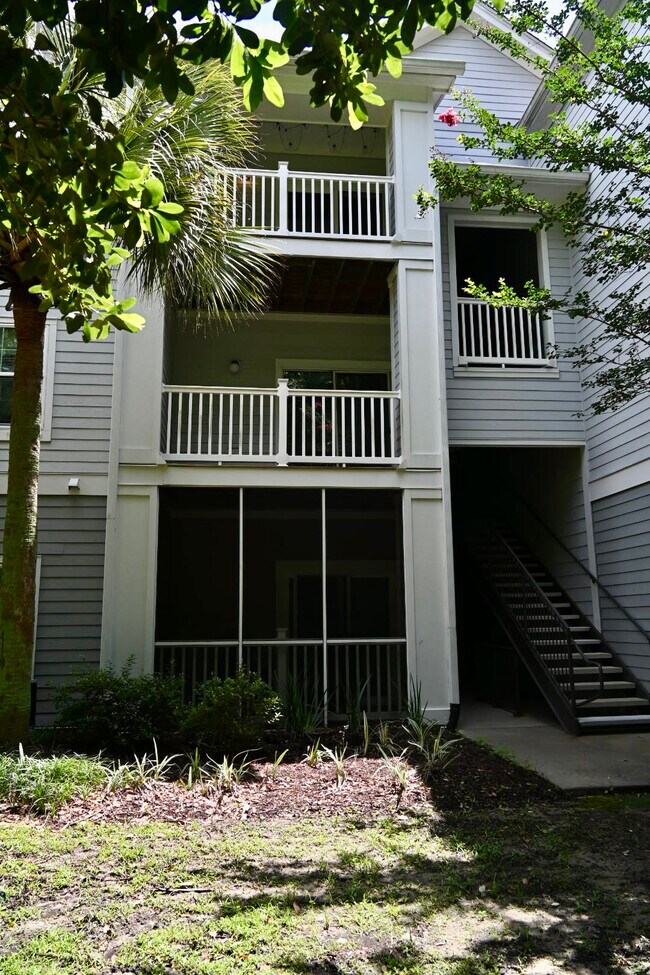 porch off back overlooking private wooded area - 1300 Park West Blvd