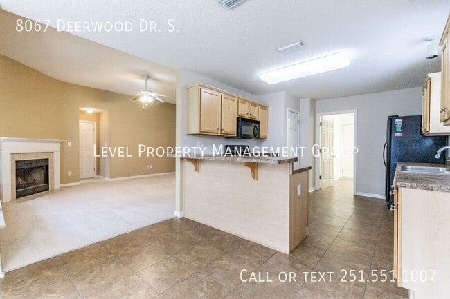 Building Photo - 8067 Deerwood Dr