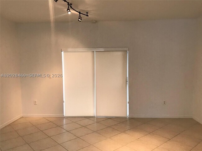 Building Photo - 5743 NW 114th 106
