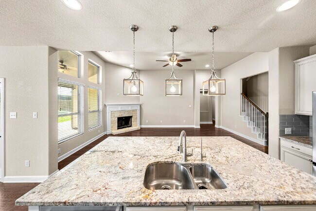 Building Photo - No Rear Neighbors, 3 Car Garage, a Chef's Kitchen, and Room for Everyone