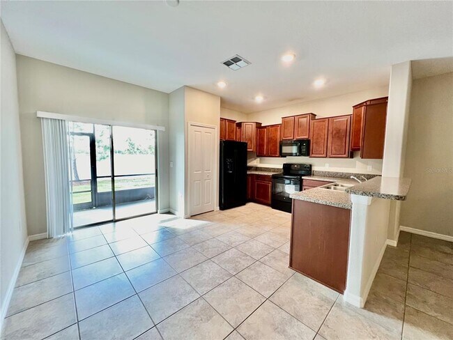 Building Photo - 7639 Ginger Lily Ct