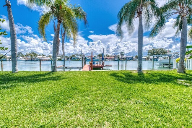 Building Photo - Treasure Island Three Bedroom, Two Bath Furnished Single Family Home on the water.