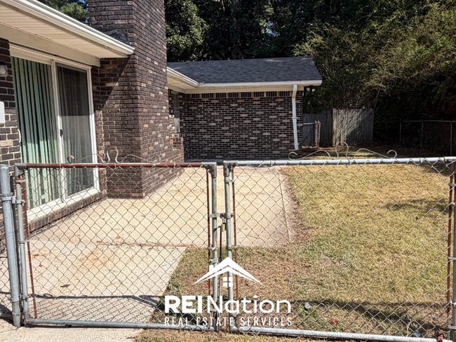Building Photo - MASSIVE BESSEMER RENTAL! 4BR/2.5BA | High Ceilings & Brick Fireplace | 2-Car Garage!