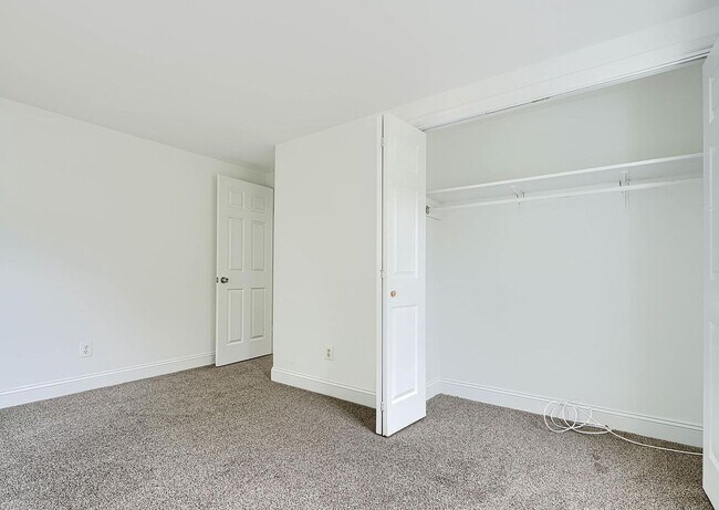 Building Photo - Updated End-of-Group Townhome with Finished Lower Level, Fenced Yard & Community Pool