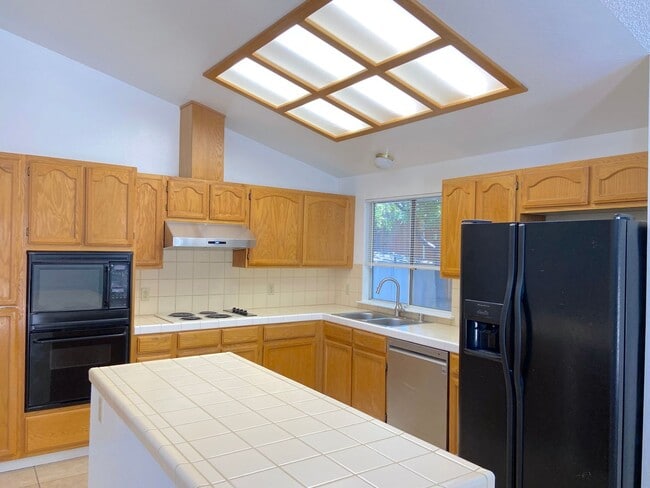 Building Photo - Coming Up Roses - NW Reno 4 Bedroom/3 Car Garage Single Story House