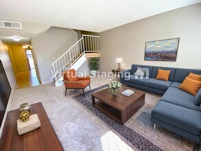 Building Photo - Renovated townhome features 2 Beds and 1.5...
