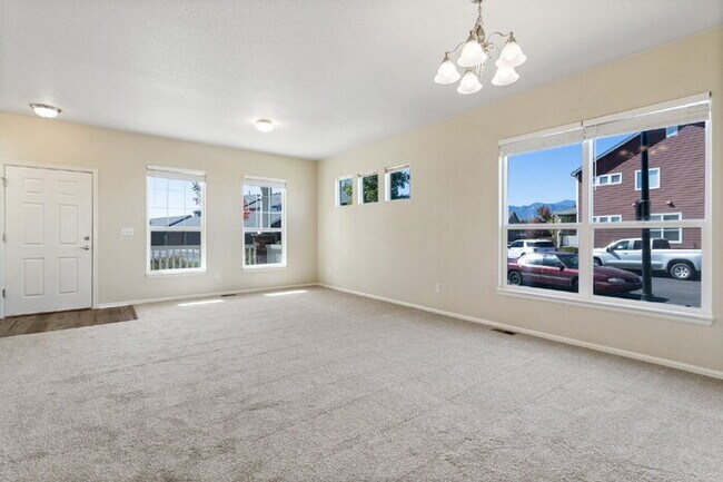 Building Photo - Spacious End-Unit Townhome with Greenbelt Views and Detached 2-Car Garage