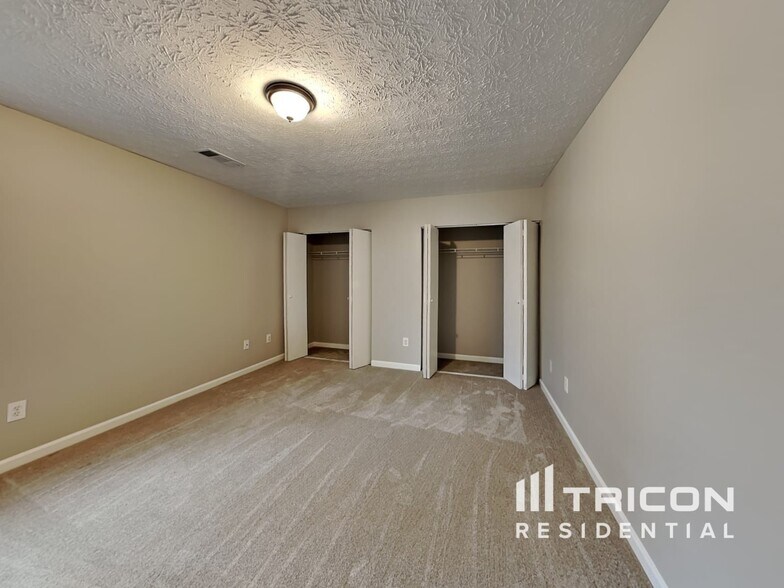 Building Photo - 8665 River Rock Ct