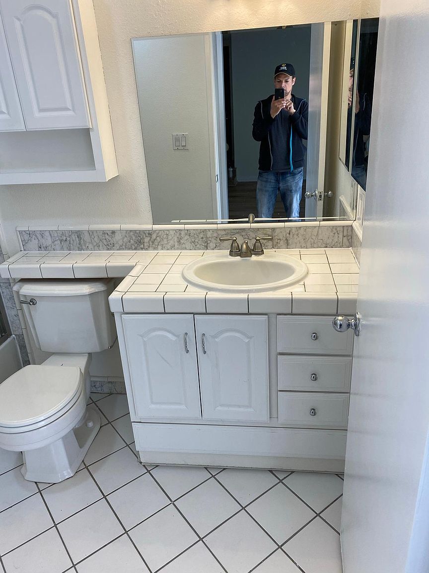 Bathroom vanity with additional storage - 8305 Summertime Ln
