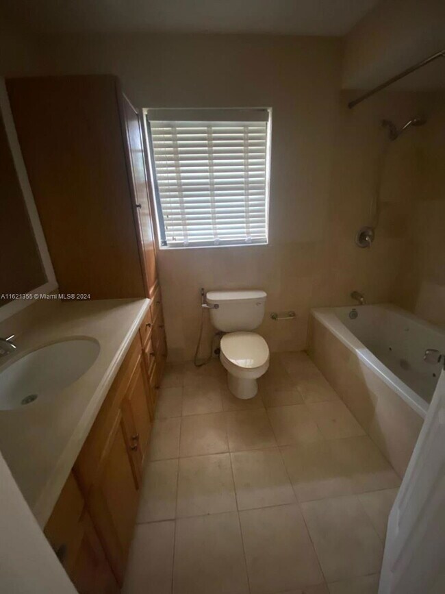 Building Photo - 4100 W 14th Ave