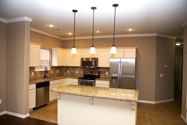 Building Photo - Available Now! 4-Bedroom, 3.5-Bathroom Hom...