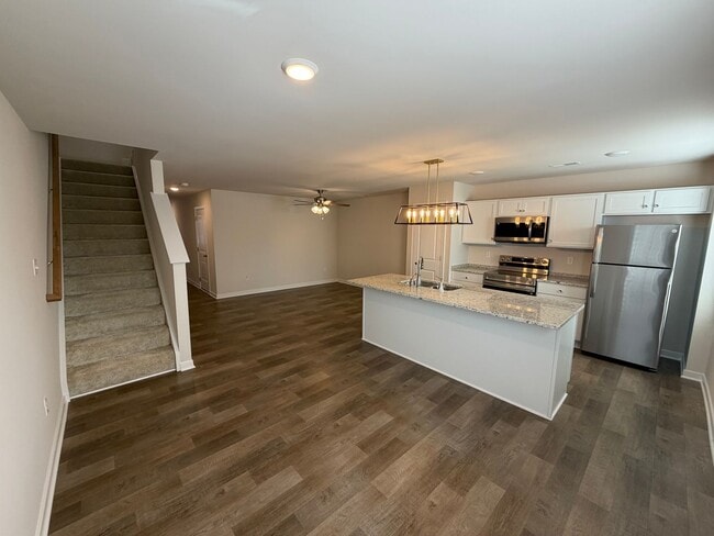 Building Photo - Modern Two-Story Townhome with Open Floor Plan and Garage