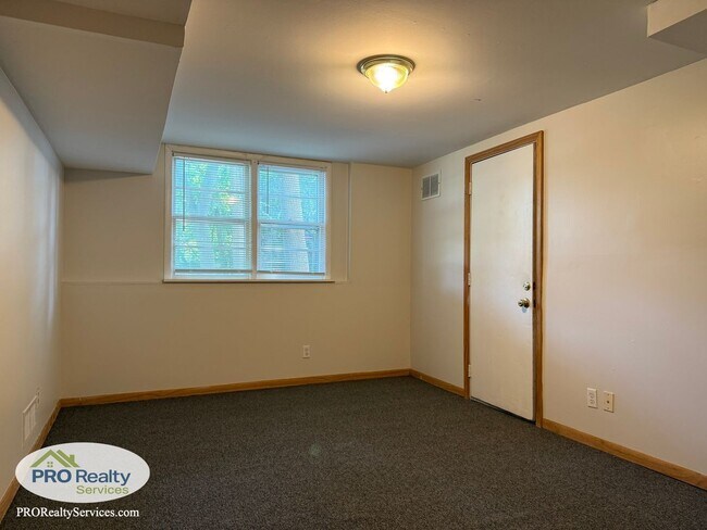Building Photo - 4 Bedroom Home One Block from Medicine Lake
