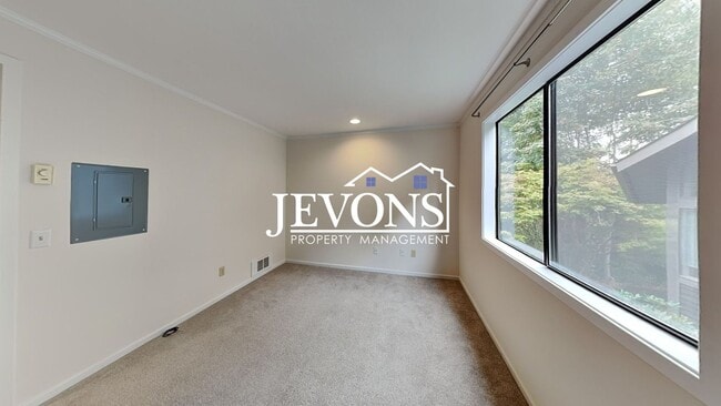 Building Photo - Top-floor 2-level condo with brand-new kitchen and ensuite bath – Utilities and internet included...