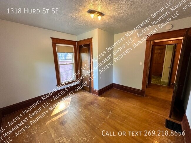 Building Photo - Eastown Three Bedroom Clean Home