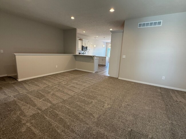 Building Photo - Brand new ranch townhome with 3 stall gara...