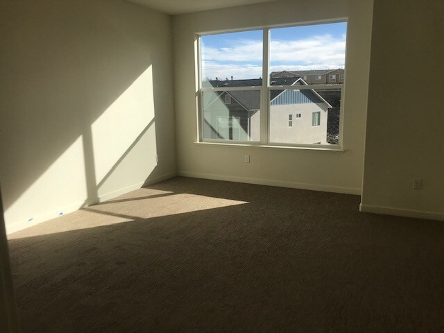 Building Photo - Brand New 3 Bedroom Townhome near UNR.