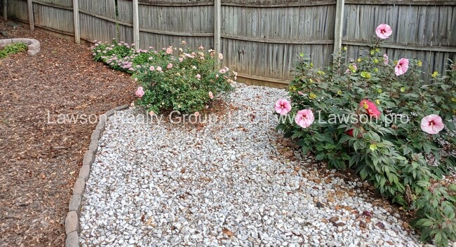 Building Photo - One Level Living- Beautifully Landscaped Yard and Attached Carport
