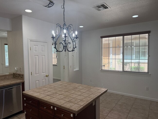 Building Photo - NICE 2-STORY CONDO 3 BED, 2.5 BATH, & 2 CAR GARAGE NEAR SHOPPING & HWY 50!