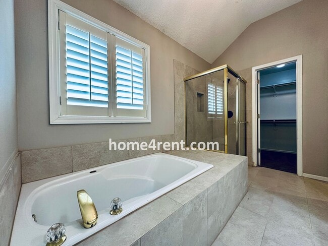 Building Photo - Updated Kitchen, Large Two Tiered Deck, Finished Basement in Blue Valley Schools!