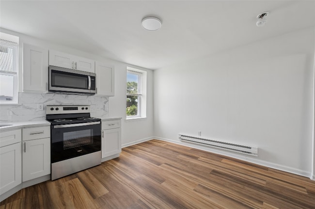 Building Photo - 6154 Glenmore Ave