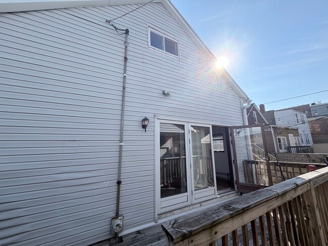 Building Photo - 3206 S Lowe Ave