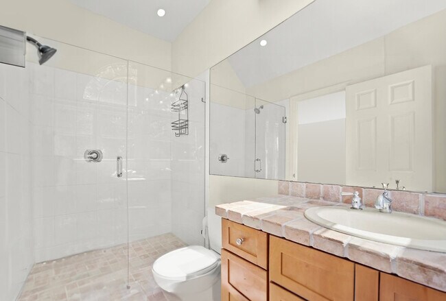 master bath with walk-in shower with frameless shower doors - 3B Ludlow Rd