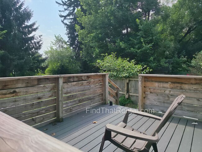 Building Photo - Available August 16! A pet friendly ranch with dishwasher, garage, basement, storage, yard, deck