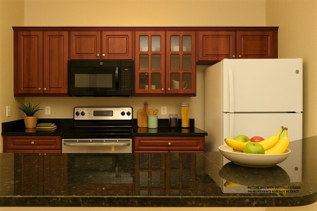 Building Photo - Spacious 2 bed 2 bath condo, split floorplan on the 3rd floor! Gated community at Mosaic at Millenia