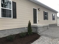 Building Photo - Spacious 2 bedroom, 2 full bath unit with large temp controlled storage unit!