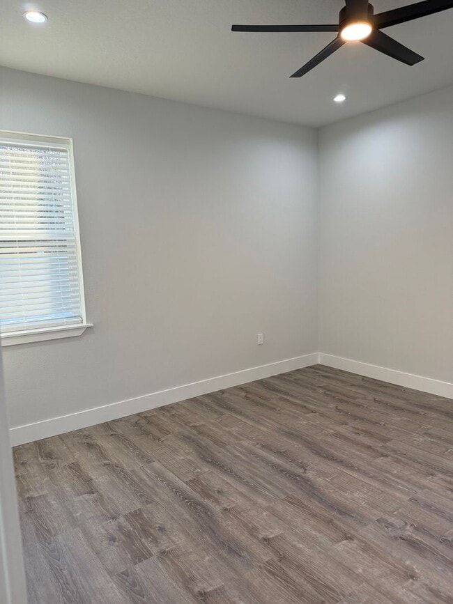 Building Photo - Brand new 3/2/2 with fenced in yard and a screened in porch!