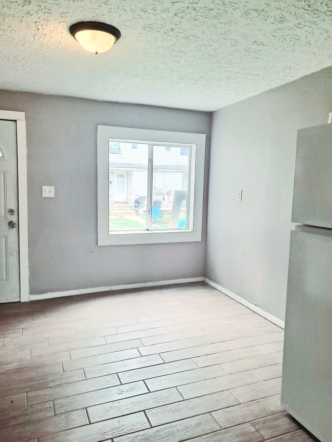 Building Photo - 9042 Maple Grove Rd