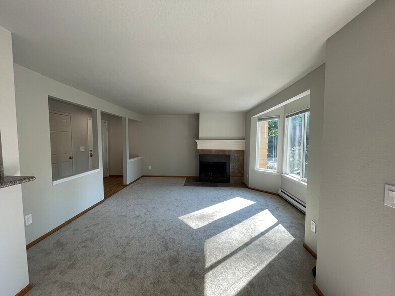 large living room with bay windows - 280 NW Holly St