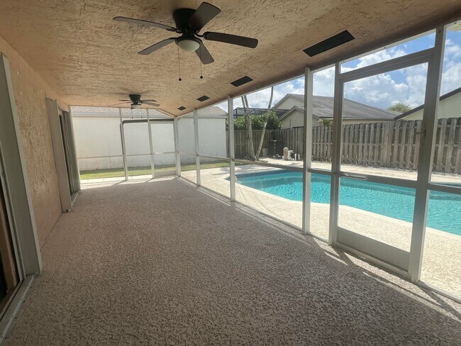 Building Photo - Rustlewood Avenue, Boca Raton, FL 33428 - 4 BR 2 BA single-family home