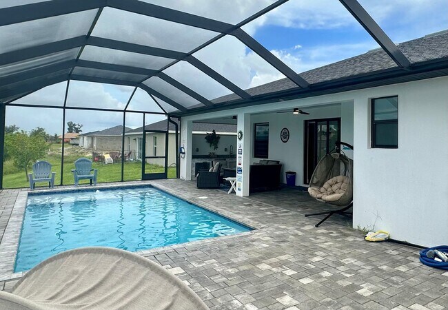 Building Photo - Fully Furnished Annual Rental- 3 Bedroom 2 Bathroom - Pool and Waterfront- NE CAPE CORAL