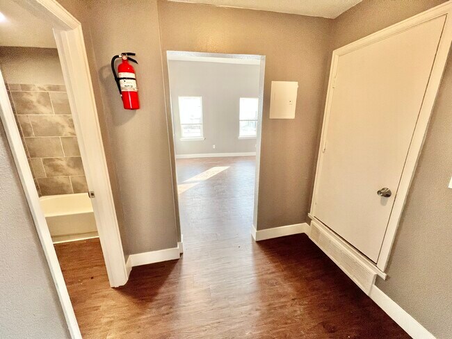 Step into this stylish apartment, featuring elegant wood flooring and abundant natural light. - Williams Street