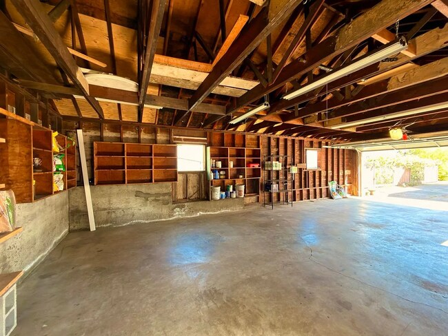 Building Photo - This spacious four-bedroom, two-bathroom