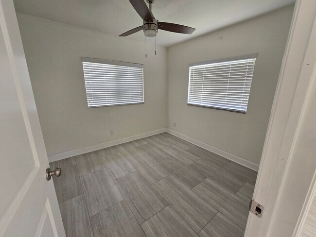 Building Photo - 3 Bedroom W/ Den + Office Space + 2 Car Garage and Fenced in Yard - Annual Rental