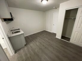 Building Photo - 1835 NE Hillaire Ct