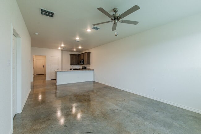 Building Photo - Brand New 3BR Duplex with Modern Concrete Floors & Fenced Yard!