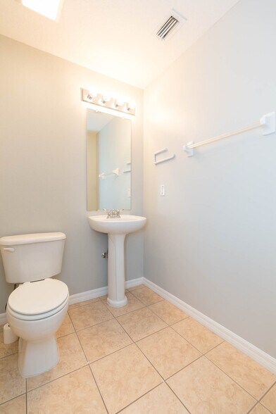 Half bath downstairs off foyer - 18135 Nassau Point Dr
